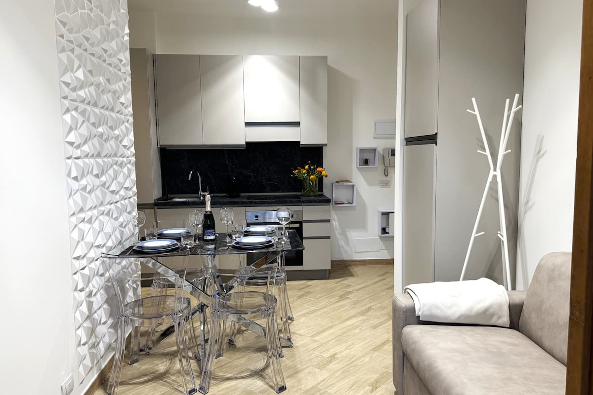 Soggiorno e cucina di Dimora Cabiria