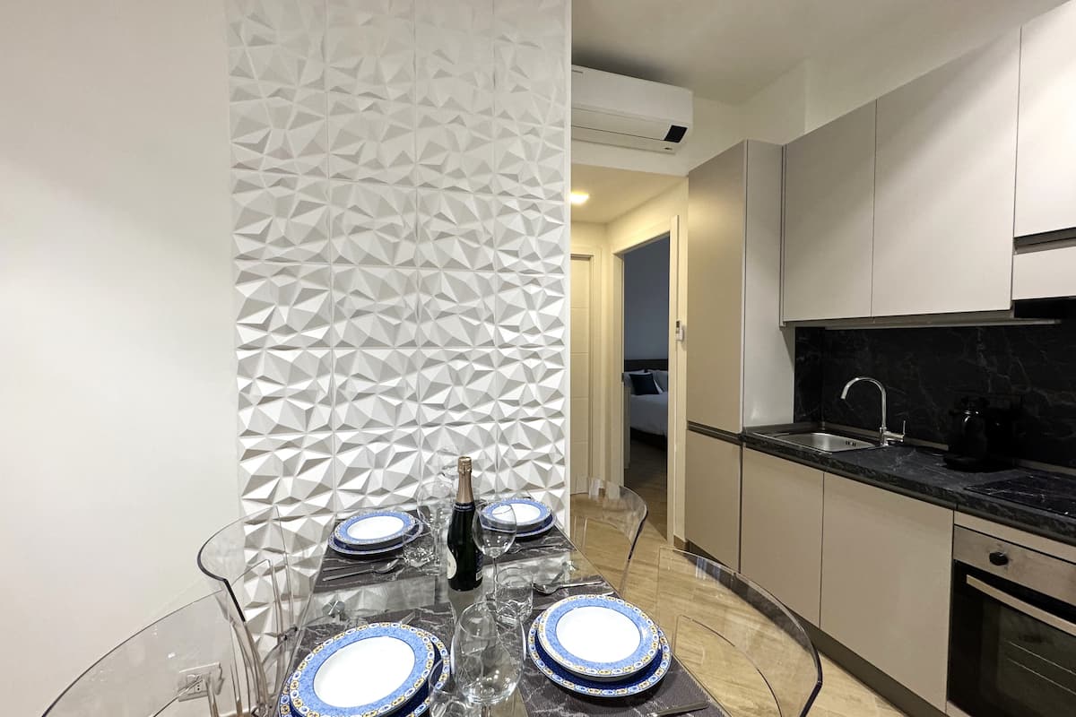 Soggiorno e cucina di Dimora Cabiria